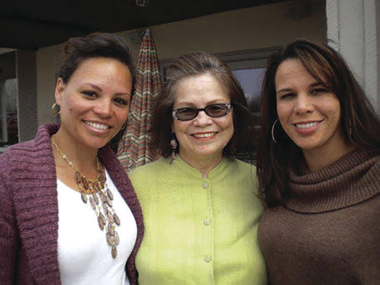 Sisters Lana, left, and Natalie, right, with their mum Donna-Gail, centre