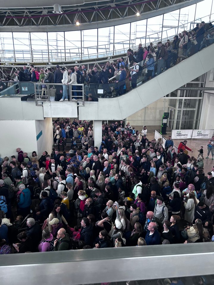 Hundreds of tourists were forced to queue in crammed conditions for up to two hours