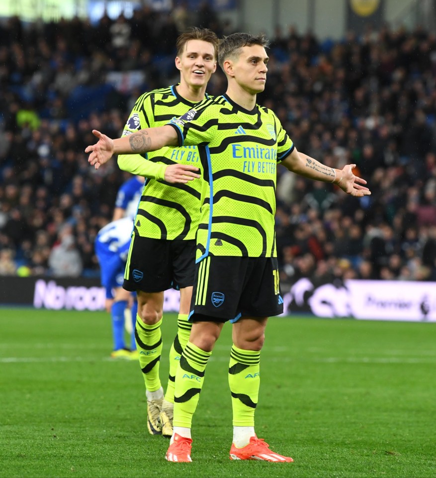 Leandro Trossard celebrates scoring Arsenal's third at the Amex Stadium