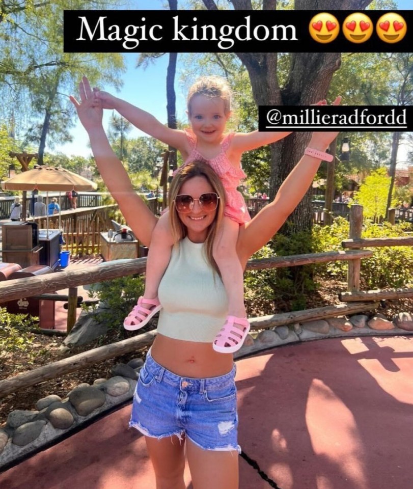 Millie’s sister Sophie posed up with Ophelia on her shoulders as they hit the Magic Kingdom