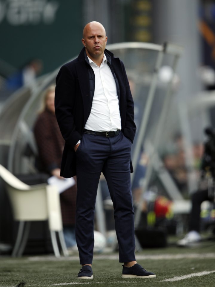 Arne Slot watching on from the sidelines during the Eredivisie match between Fortuna Sittard and Feyenoord Rotterdam on April 14, 2024