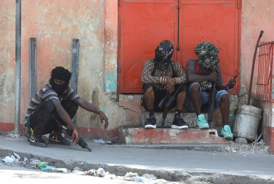 Masked men with automatic weapons prowl the streets