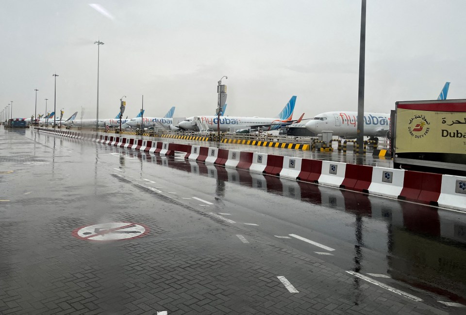 A witness shows their view from inside a bus of a Flydubai aircraft at DXB