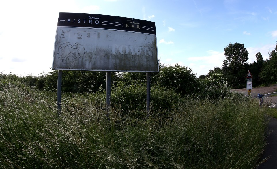 Signs remain showing the site's former life