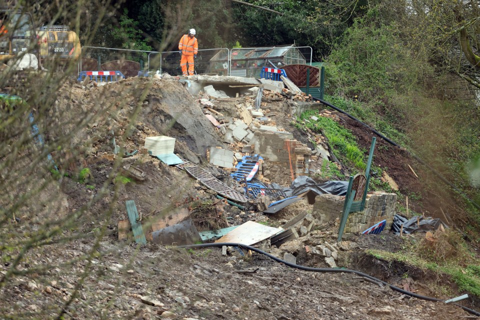 Debris from the house demolition on the Woodlands Estate in Baildon, West Yorkshire, has fallen down the landslide