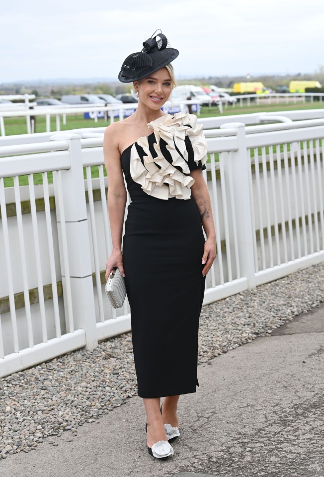 Helen Flanagan looked stylish in a monochrome ensemble at the Grand National Festival