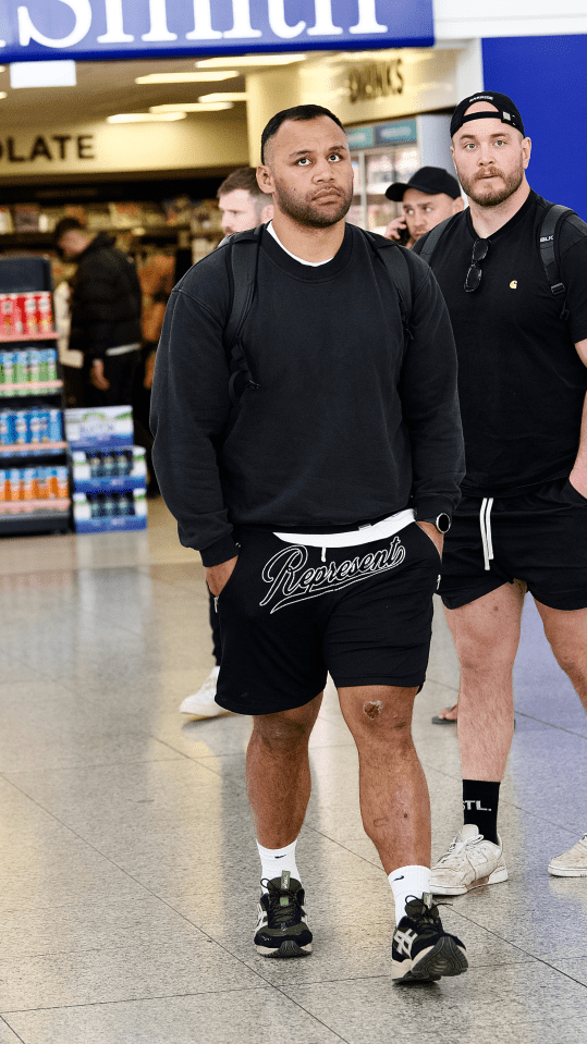 The Sun's exclusive pictures show Vunipola wandering through the airport