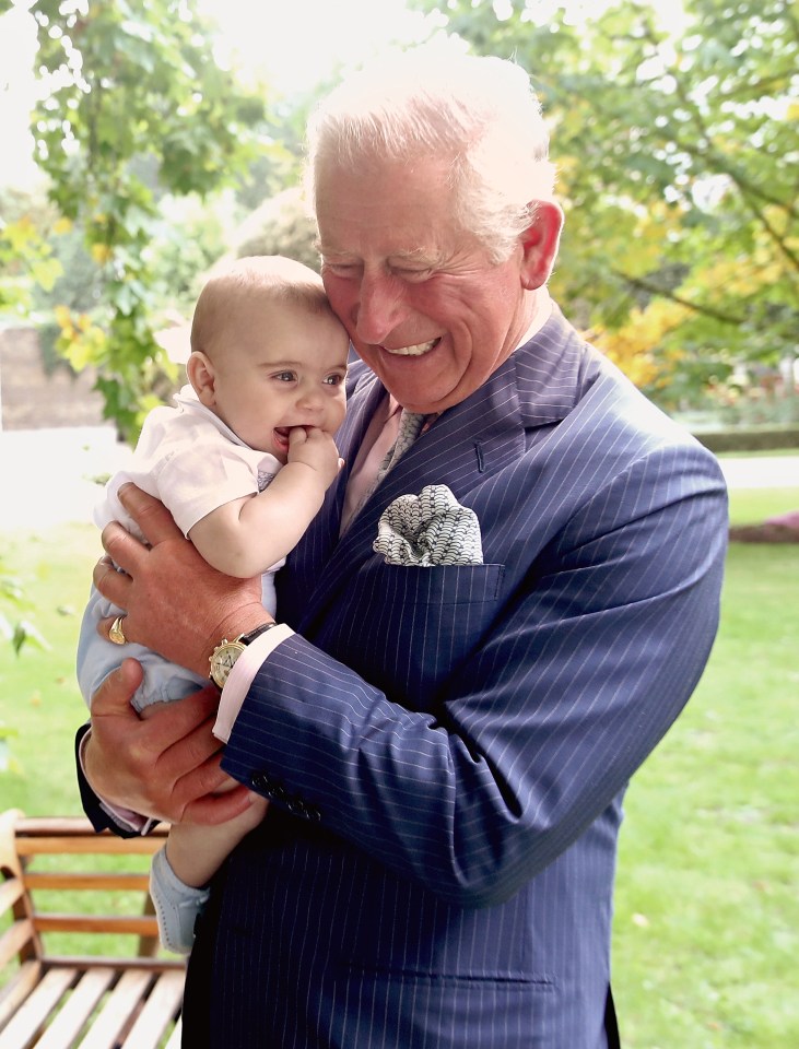  Prince Louis with his grandfather King Charles just after he was born