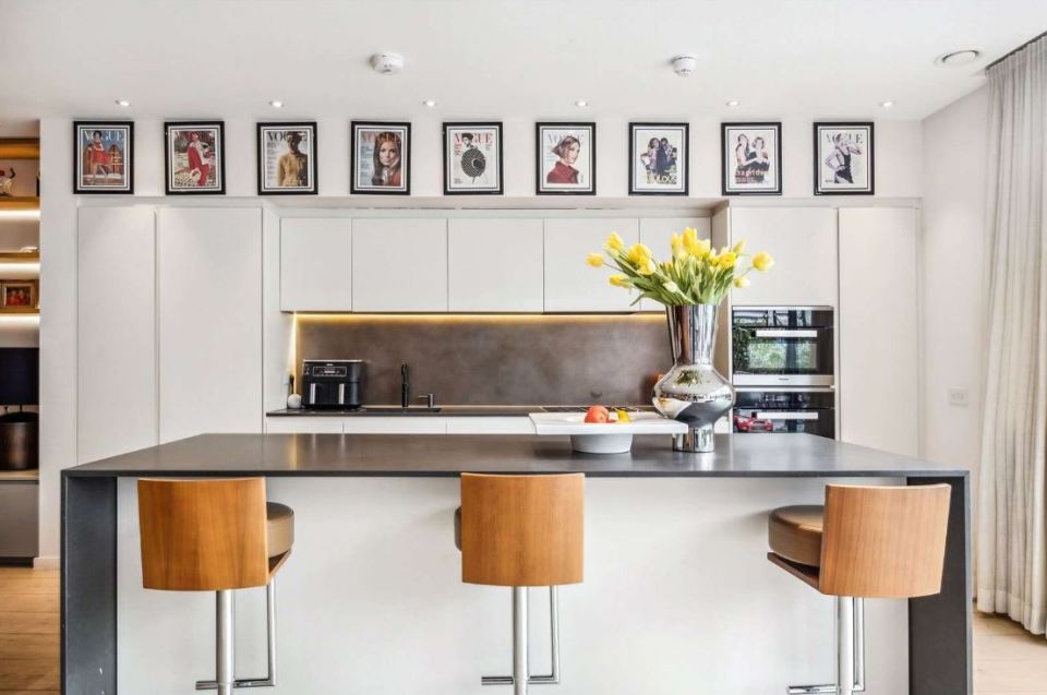 The family home includes a kitchen that looks out onto the garden