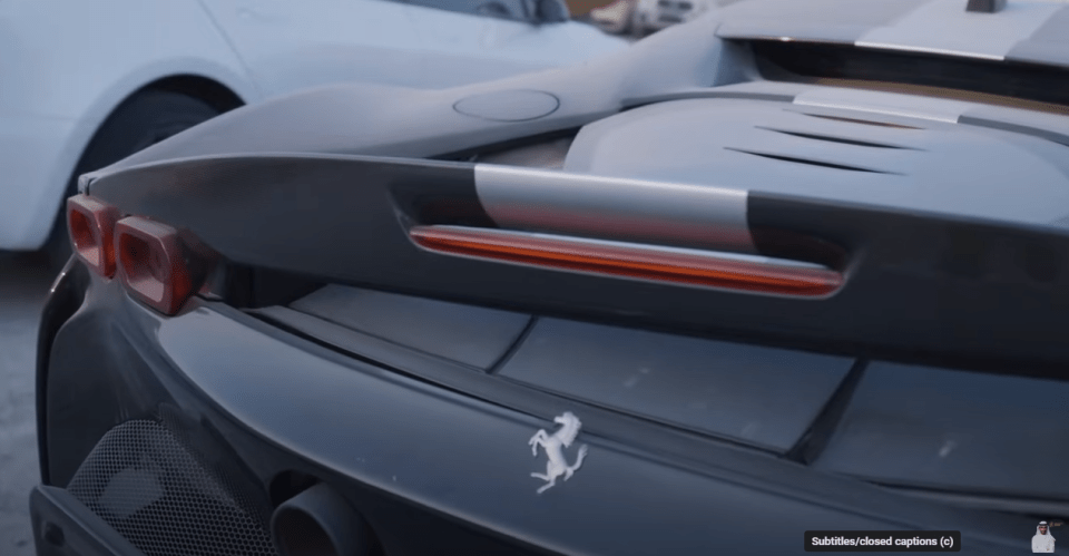 Multiple Ferrari's sit under the sun at the auction