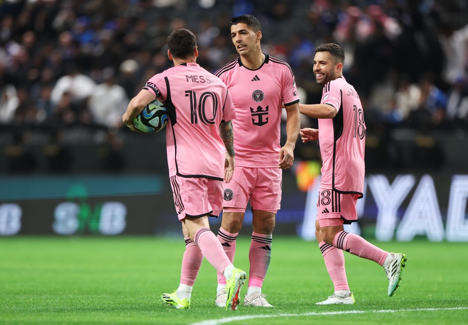 Messi with team-mates Suarez and Alba