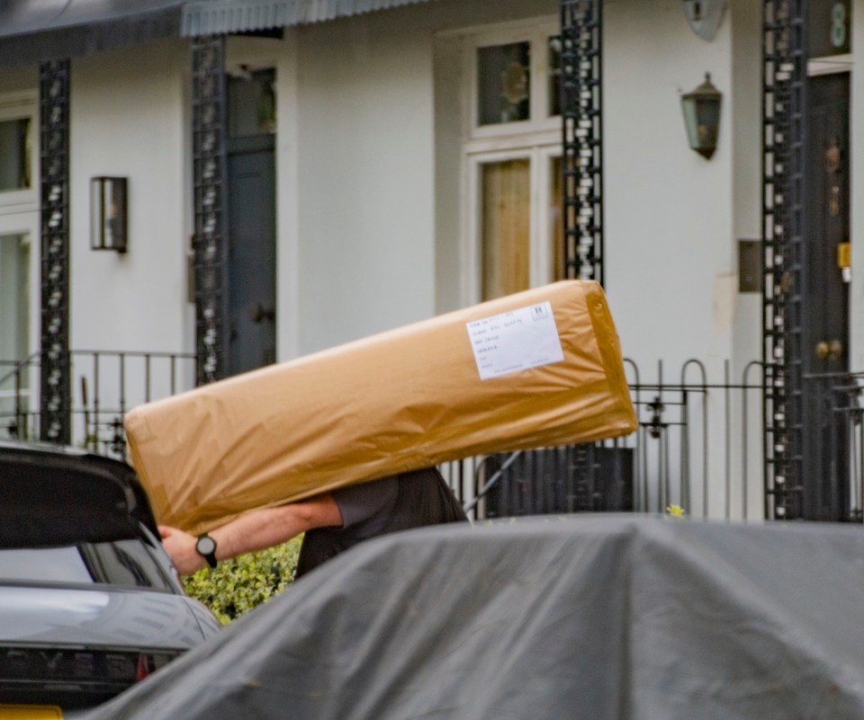 Snaps show Ellie's possessions being carefully wrapped up as a label revealed they were being placed into storage