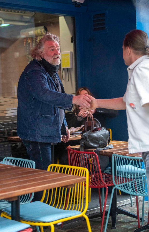 The 57-year-old cut a casual figure in double denim wearing jeans and a jacket