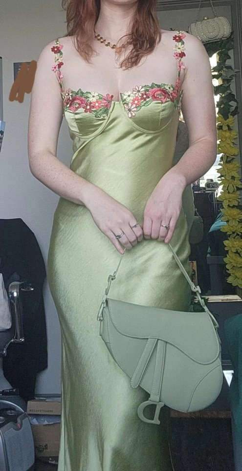 A woman has shared the dress she is planning on wearing to a pal's wedding