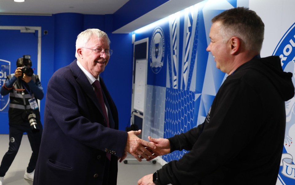 Sir Alex Ferguson congratulates son Darren after Peterborough's win over Wycombe