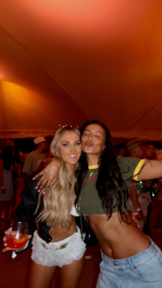 Maya Jama flashed her toned abs in a crop top and denim as she partied at Coachella with Jessie Wynter