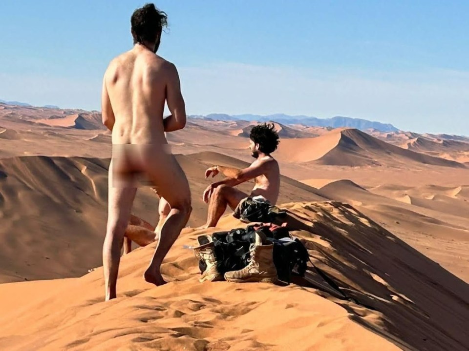 Three tourists were pictured stark naked on a dune in Namibia