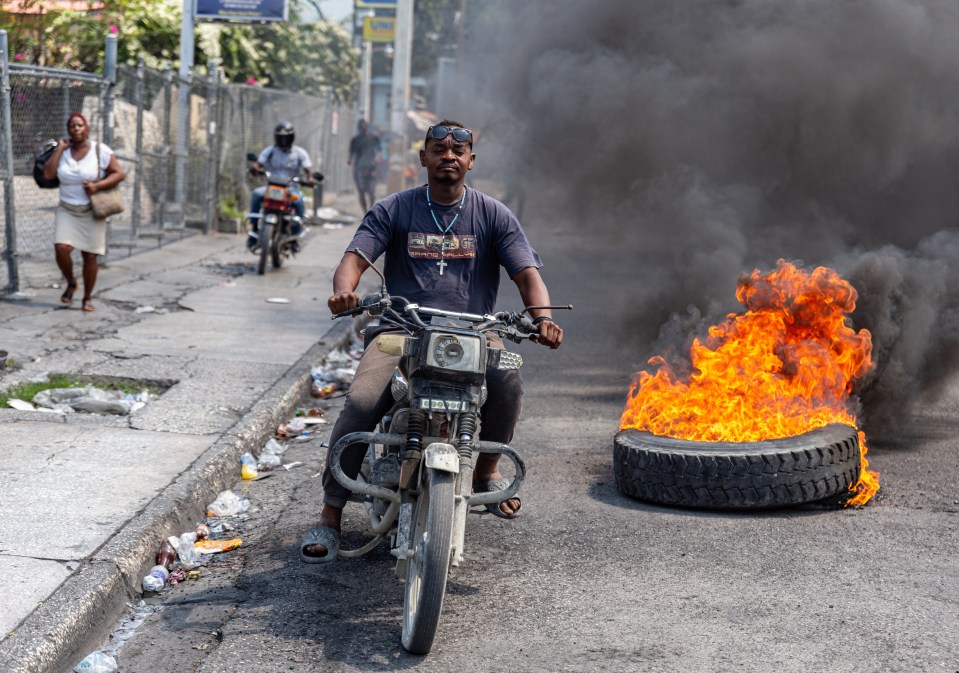 Bodies and tyres burn in the middle of roads as the city is plunged further into anarchy