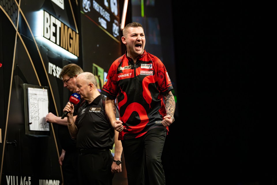 Nathan Aspinall has suggested his heavy darts helped him get the better of the windy conditions in Rotterdam