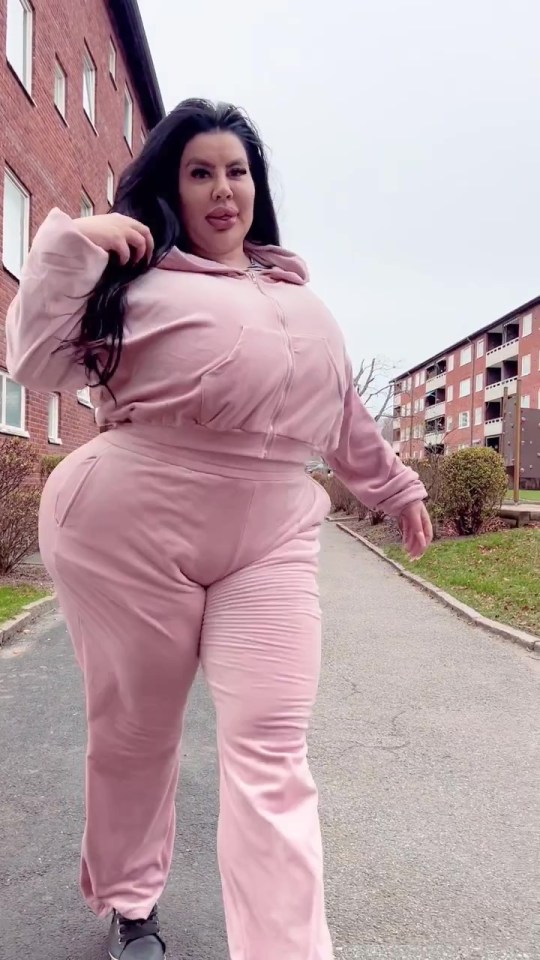 Natasha loves showing off her curves on the estate