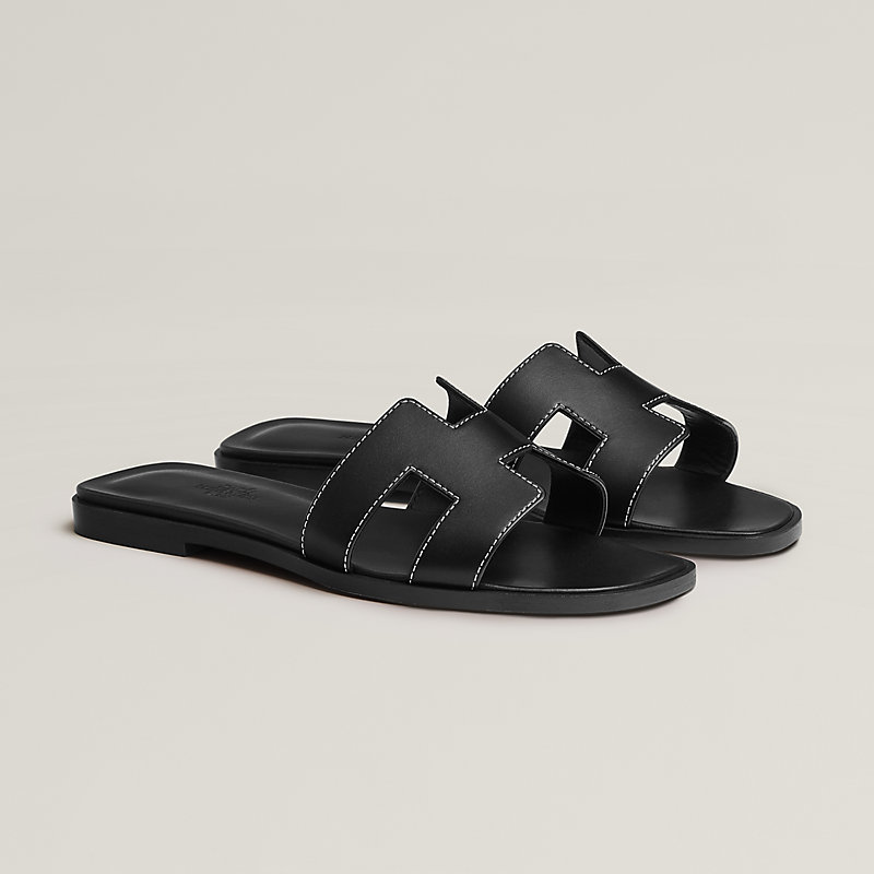 Many fashion fans compared them to the iconic Oran sandals from Hermès (pictured)