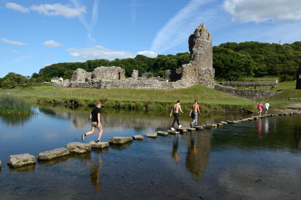 Ogmore Castle is famous for its stepping stones across the River Ogmore