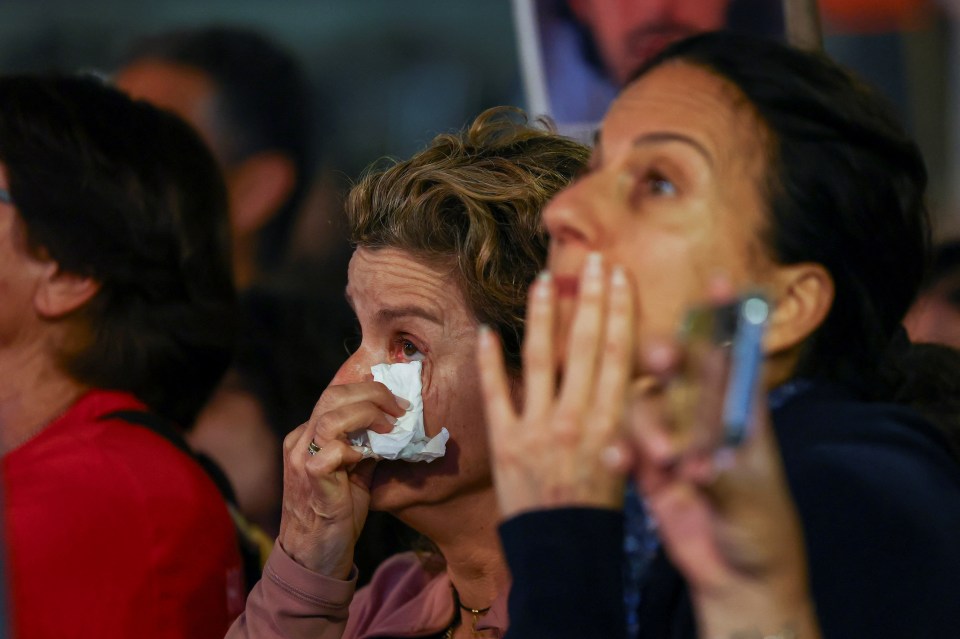 Israelis react to calls for the immediate release of hostages at a protest on April 18