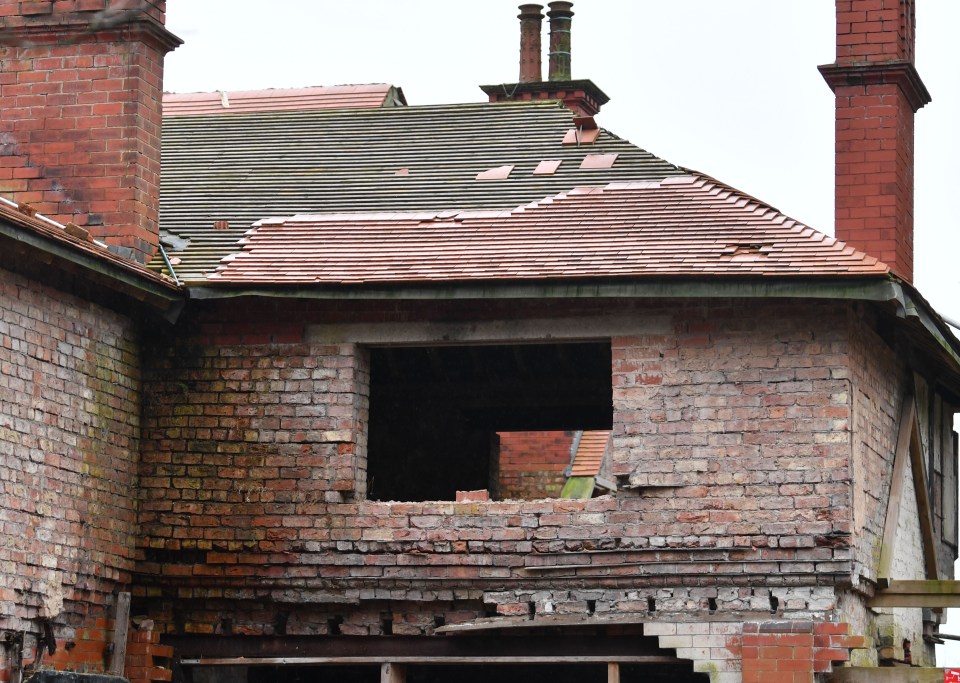 Parts of the home has been pulled to bits, with holes all through its roof