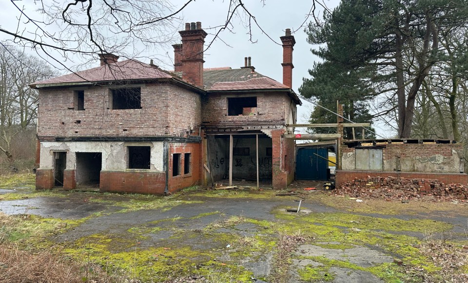 Its grounds are completely overgrown with rubbish seen littered around