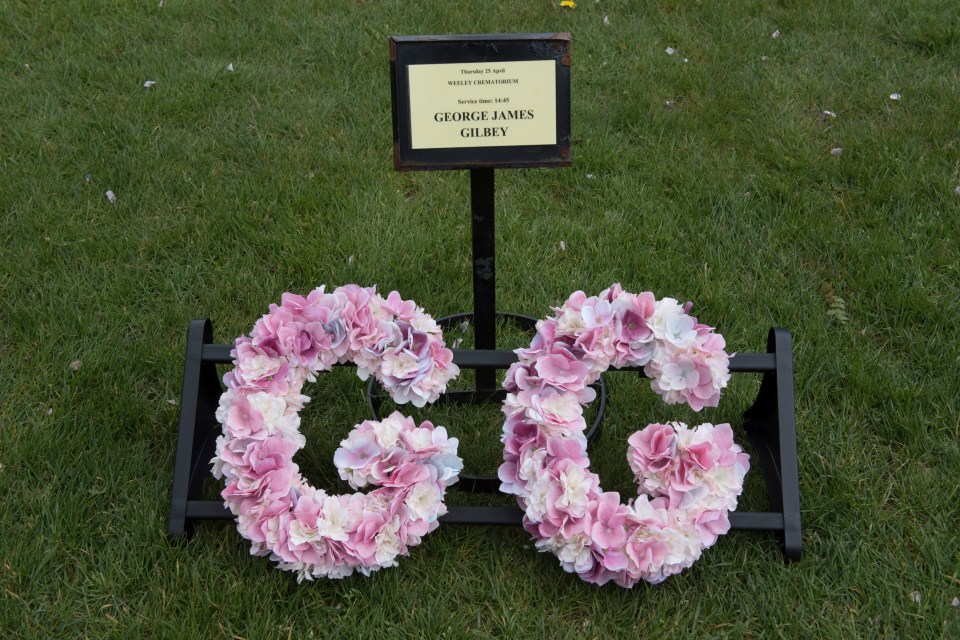 Flower wreaths were laid with the Gogglebox star's initials