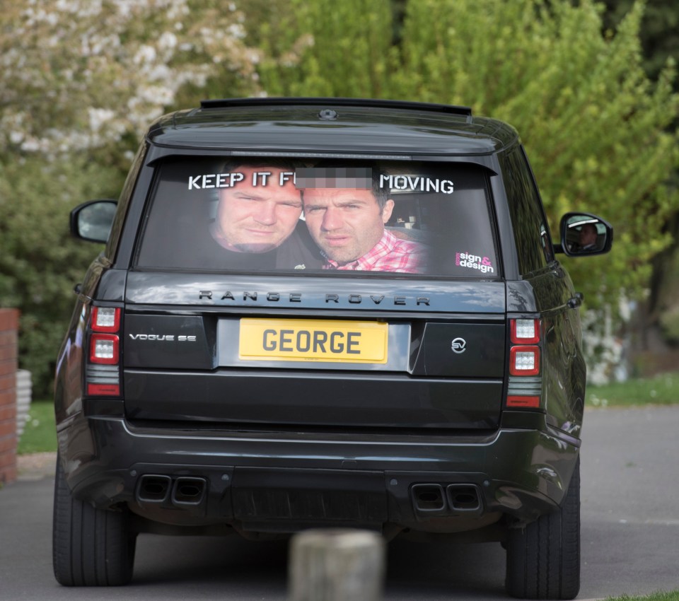 A black Range Rover donned a picture of the TV star at the service