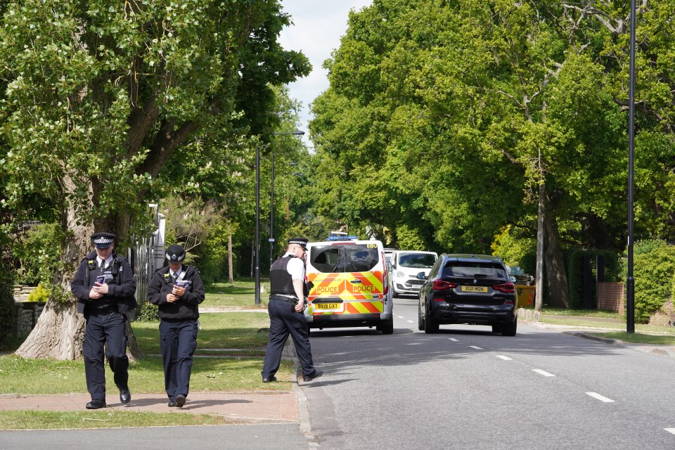 Police officers arrives at the property