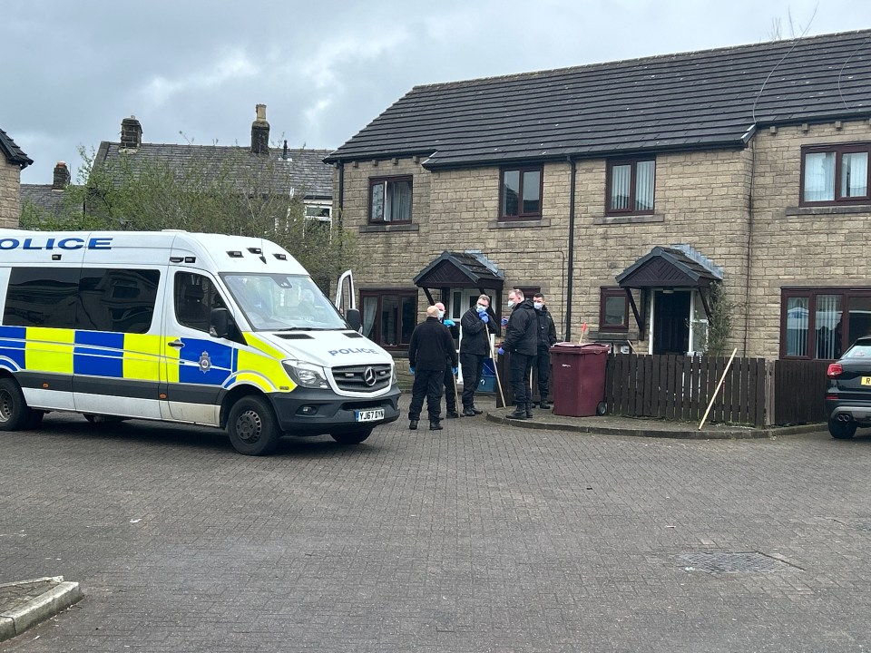 Cops combing the Burnley street for evidence