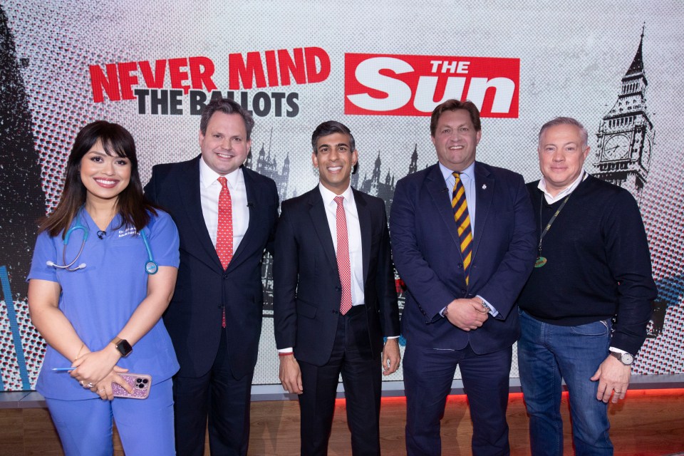 The PM poses with Sun Health Secretary Bhasha Mukherjee, host Harry Cole, Sun Defence Secretary Hugh Andree and Sun Transport Secretary Grant Davis