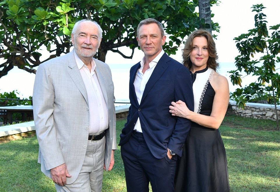 Michael G Wilson, Daniel Craig and Barbara Broccoli