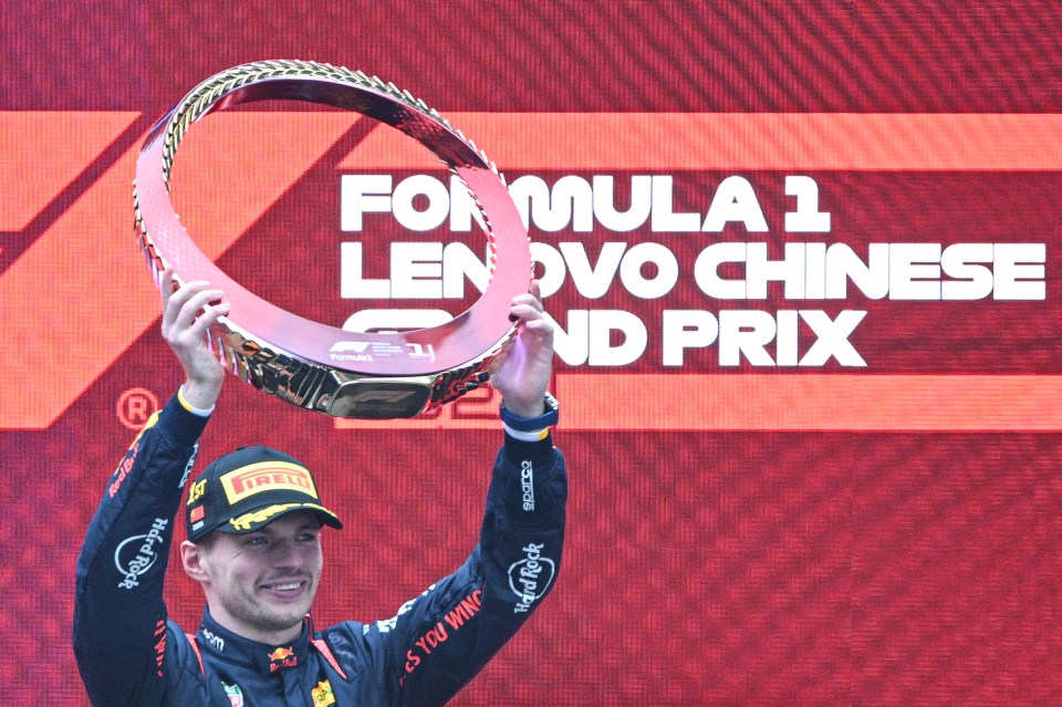 Verstappen, 26, hoists the trophy in Shanghai