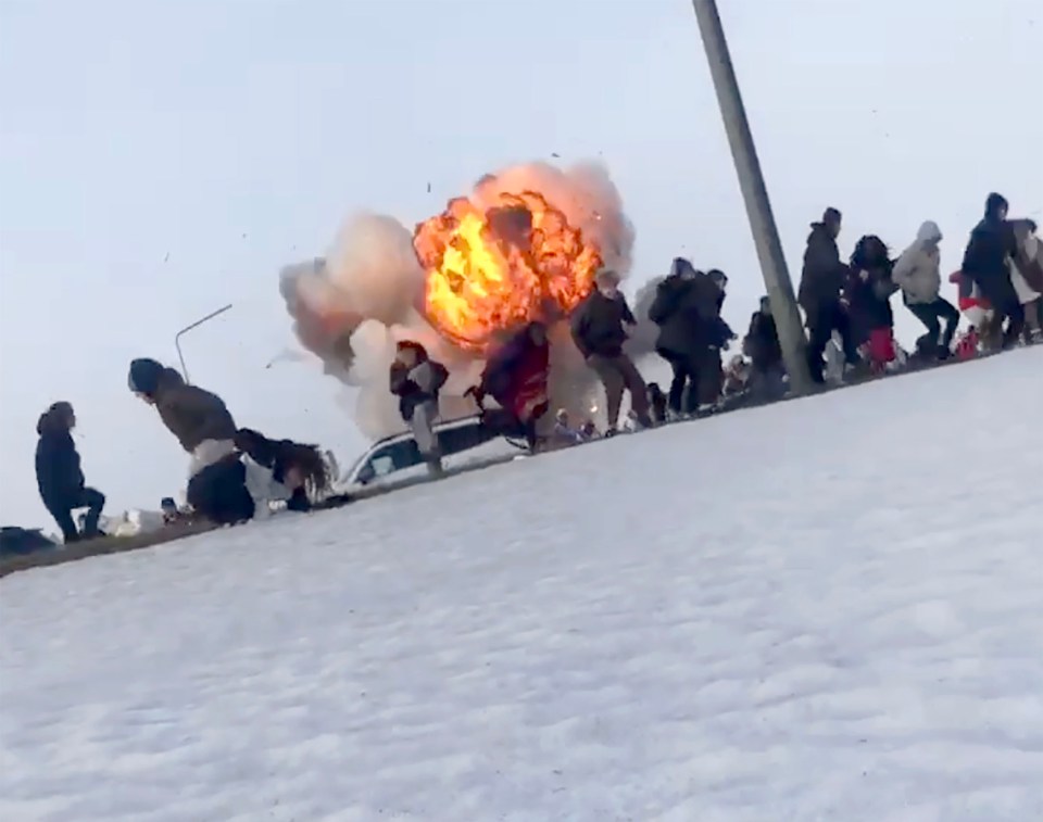 Footage shows panicked onlookers fleeing