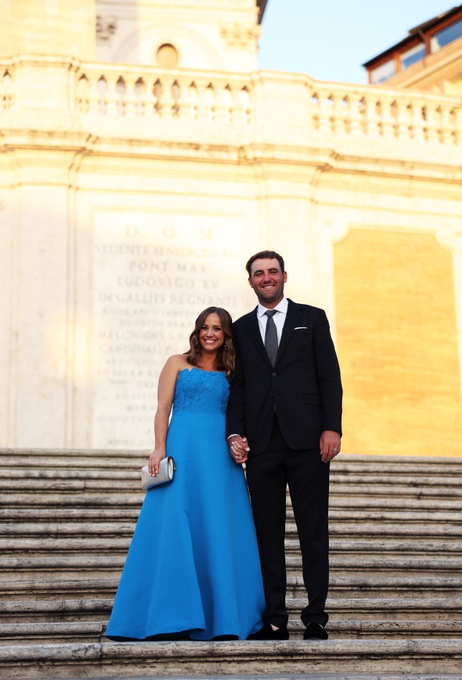 Scottie Scheffler and his wife Meredith Scheffler pose for photos at the Spanish Steps before the 2023 Ryder Cup at Marco Simone Golf Club on September 27, 2023, in Rome, Italy