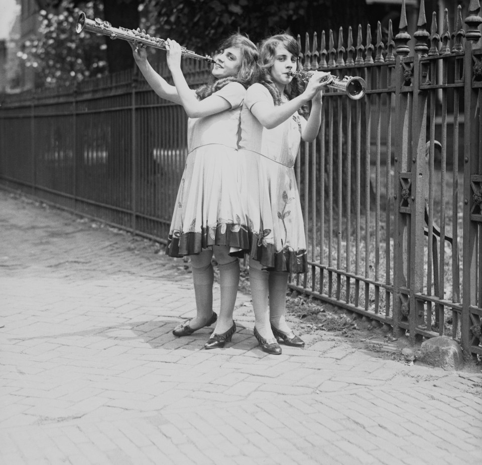 Violet and Daisy serenade officials of the British Embassy in Washington