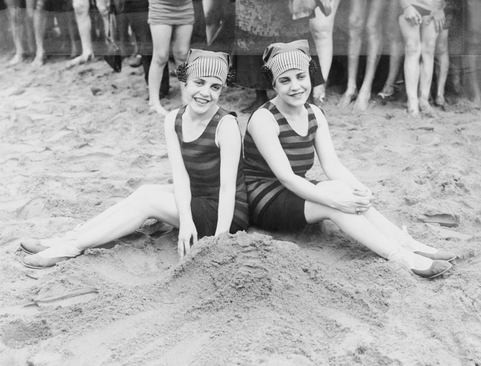 The twins enjoy their first dip of the season in the pool at Palisades Park