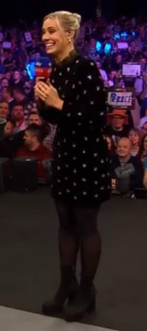 The Sky Sports presenter paired a black and white polka dot dress with tights and boots