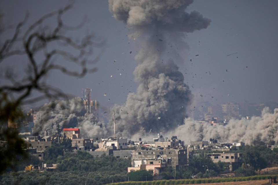 Smoke rises following an Israeli airstrike in the Gaza Strip seen from southern Israel