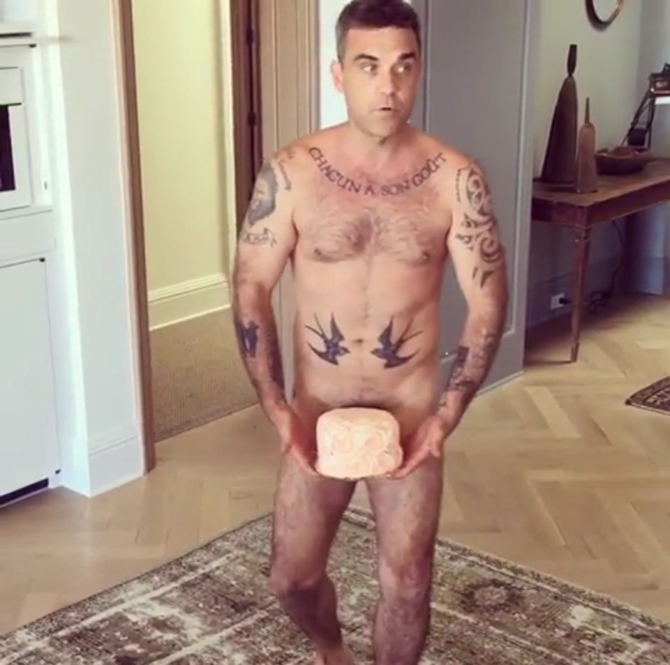 Robbie Williams is no stranger to whipping his kit off