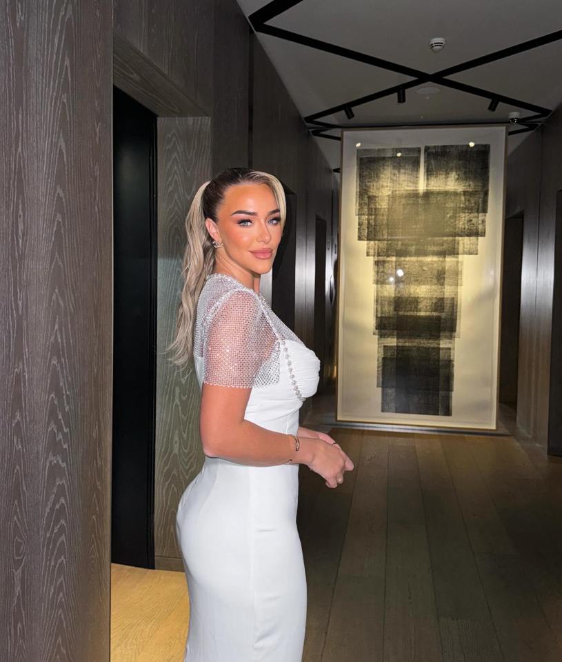 Tyalor Ward posed in a glamorous white dress