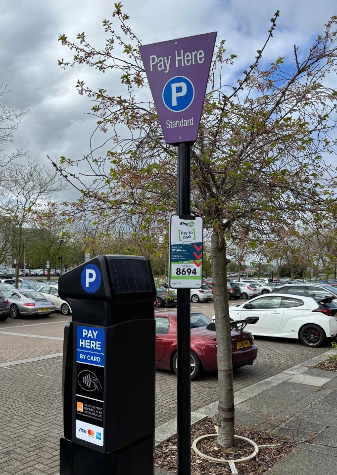 Cllr John Baker says the parking machine at the end of the 'private car park' is an entrapment scheme