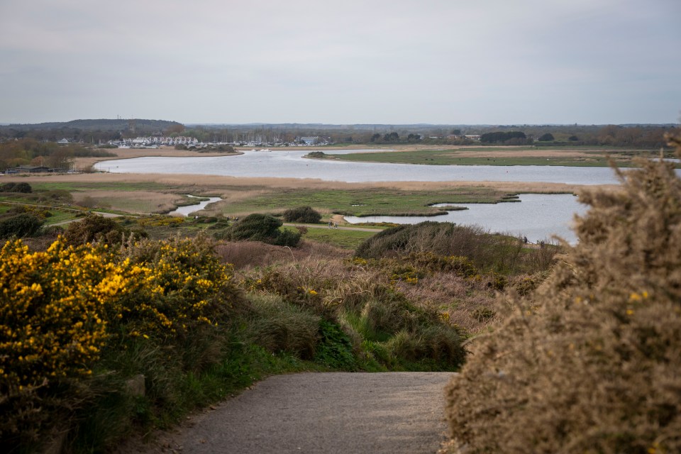 The coastal walk around Hengistbury Head has views of the Wight Bear landmark and Mudeford Quay