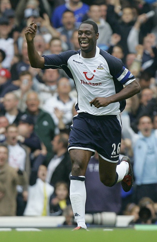 Ledley King celebrates scoring for Spurs against Arsenal - but six months after the Gunners won the league at the Lane