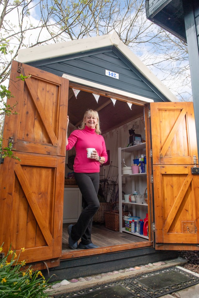 Sue Green saved her £40,000 beach hut from falling into the sea - by turning it into a garden shed