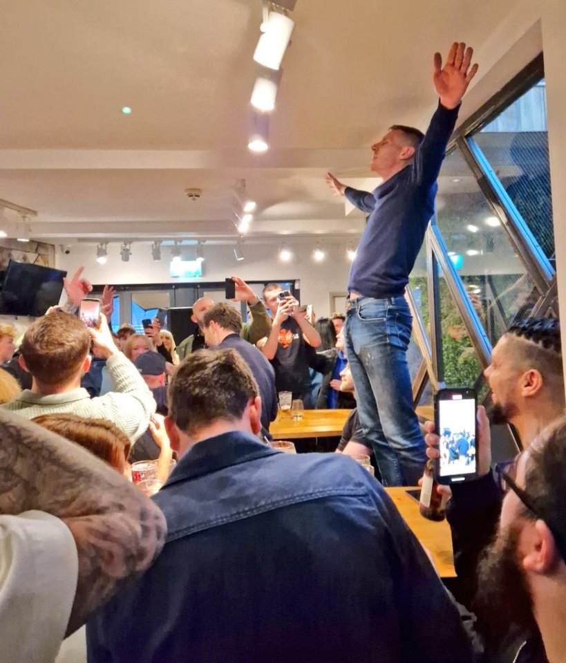 Players and staff were spotted celebrating with fans at a local restaurant and bar