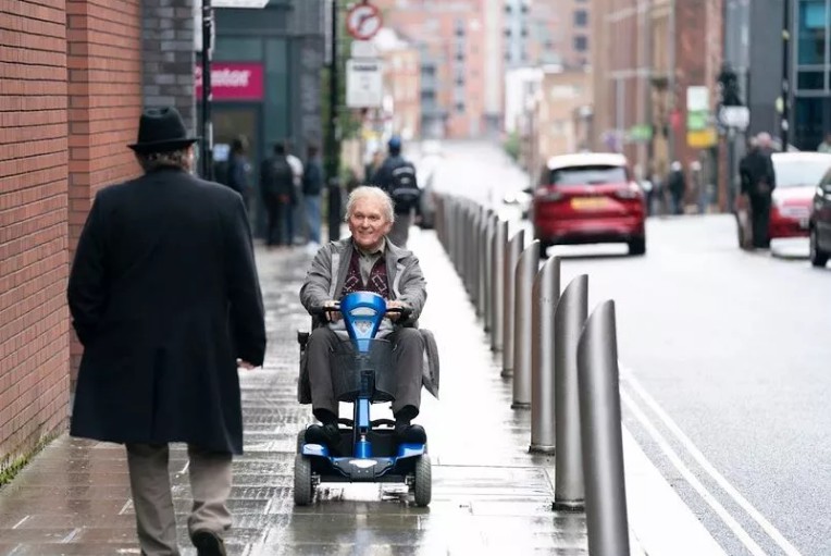 The comedian was spotted cruising around on a mobility scooter